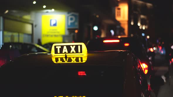 TAXI Driver Waits for Passengers Clients