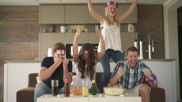 Soccer Fans Supporting Different Teams alt