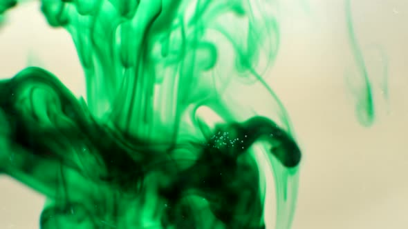 Smokey green ink drop in water LOOPING alt