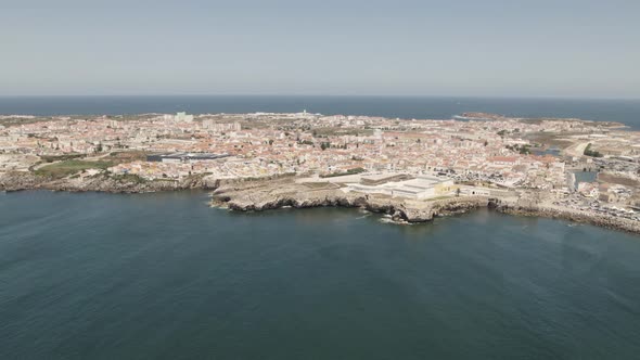 Fort of Peniche against cityscape and Atlantic Ocean. Aerial view