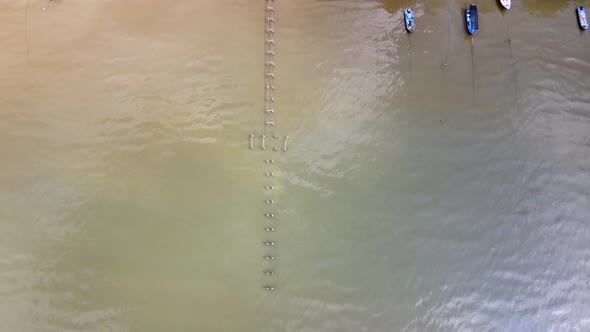 Top down view broken fisherman pier bridge alt