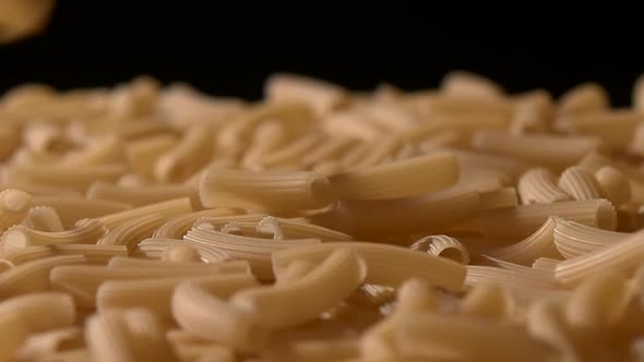 Falling Down Italian Pasta, on Black, Rotation, Close Up, Slow Motion alt