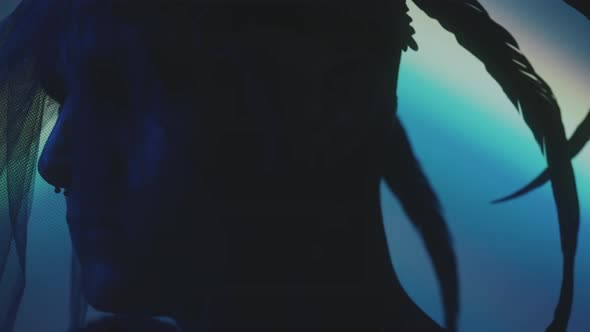 Man Taking off Black Gothic Veil alt