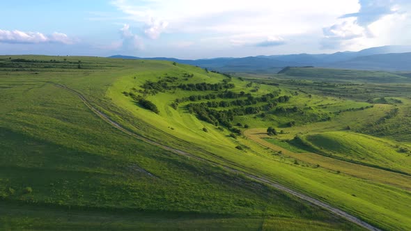 Aerial View of Countryside Vibrant Green Hills. Transylvania, Romania alt