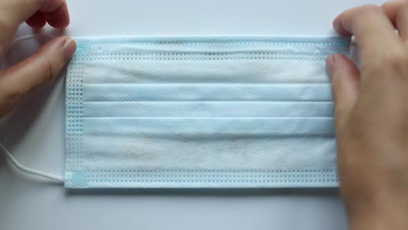 Taking Off Facial Mask From Words Welcome Home Composed From Wooden Letters on White Background alt