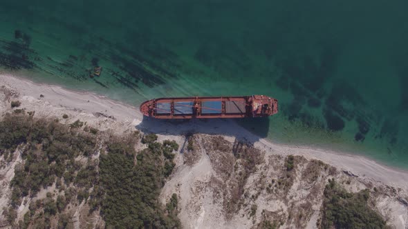 The Ship Ran Aground. Environmental Pollution at Sea. Aerial View. Grounded Ship. Drone Footage