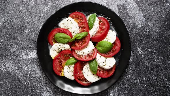 Salads with Traditional Italian Burrata and Mozzarella Cheese with Arugula and Tomatoes