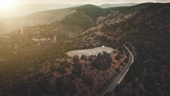 Sunset Sunrise Over Green Trees Hill Slope on Mount Olympus in Troodos Travel Destination Cyprus alt