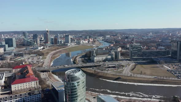 AERIAL: Citys Panorama wih Skyscrapers with Visible River Neris in Vilnius