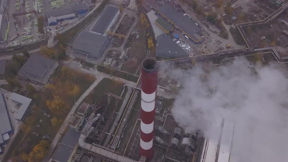 Smoke Comes From the Chimney. Aerial. Air Pollution. Ecology. Kyiv. Ukraine. alt