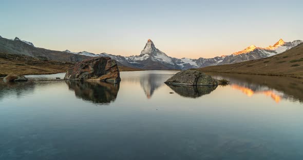 Timelapse Morning View of Stellisee Lake with Matterhorn. Exotic Autumn Scene of Swiss Alps