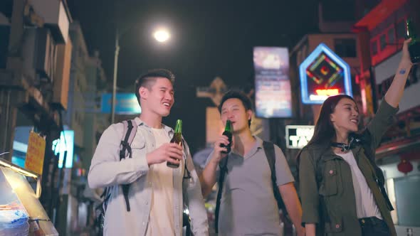 Asian attractive people drinking alcohol with friends and having party. alt