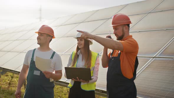 Footage with Solar Energy Station Director and Workers Communicating Discussing alt