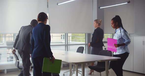Mixed Business People Having Corporate Meeting in Board Room alt