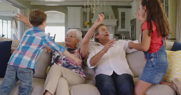 Family spending time together at home alt