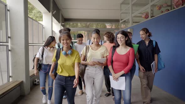 A Group of Students Walk to the Classroom to Begin Classes alt