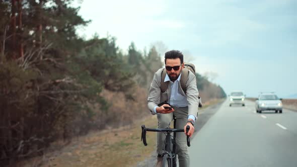 Cyclist Workaholic Rushing To Work. Overworked Stress Man On Rush Hour Cycling. Punctual Cyclist. alt