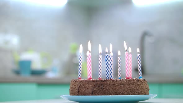 Birthday Cake with Candles Flame on Kitchen alt