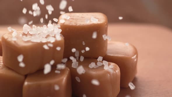 Salt poured onto caramel in super slow motion.  Shot on Phantom Flex 4K high speed camera.