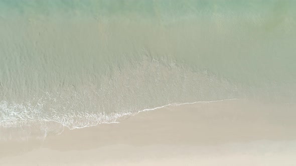 Sea waves and beautiful sand beach High quality video Bird's eye view alt