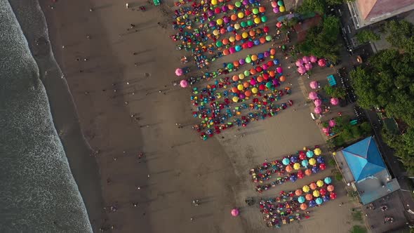 Aerial high angle view of the Beach With Parasols And Beanbags, double six beach, Kuta Bali Indonesi alt