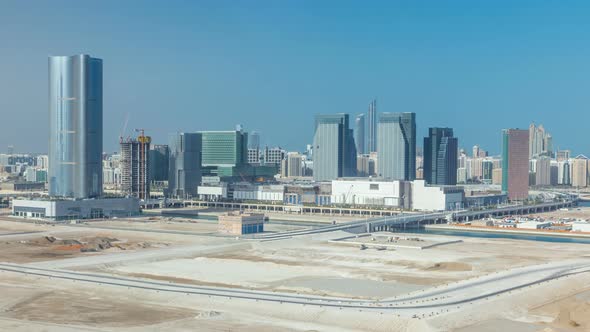 Buildings on Al Reem Island in Abu Dhabi Timelapse From Above alt