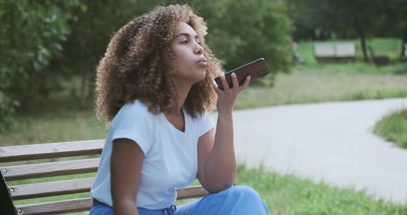 Closeup African American Woman Recording Voice Recognition Message Online Chatting Use Smartphone alt