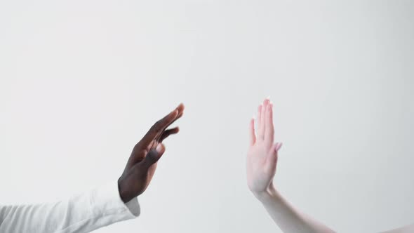 Multiethnic Friendship African Caucasian High Five alt