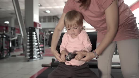 Baby with Mom in the Gym