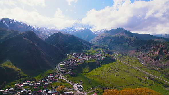 Beautiful Aerial View of Stepantsminda in the Caucasus Mountains Kazbegi Georgia alt