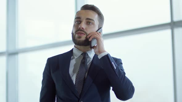 Executive Talking on Phone alt