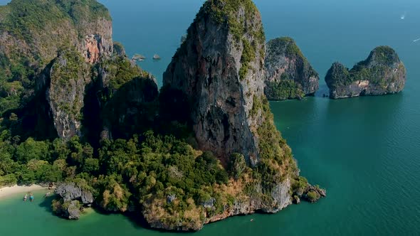 Beautiful energetic aerial shot of large limestone karst at Railay Beach, Ao Nang, Krabi, Thailand alt