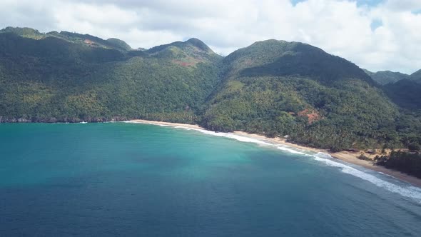 Paradise Beach In The Caribbean With Mountains And Blue Water 4k 24fps alt