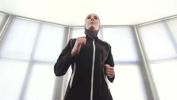Portrait of a Girl Wearing a Hijab on a Runner Fitness alt