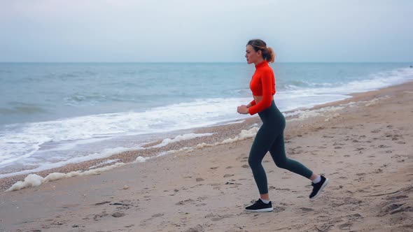 Sports Woman Trained By the Ocean