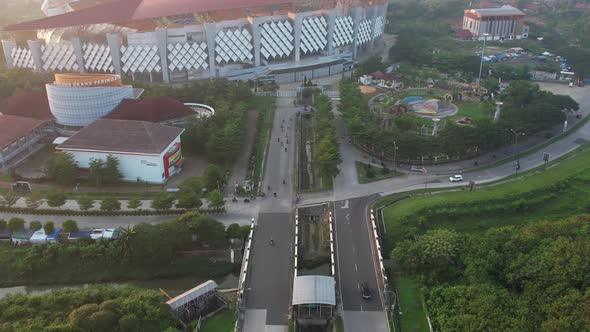 Aerial top down view of the Beautiful scenery of Wibawa Mukti Stadium when sunrise alt