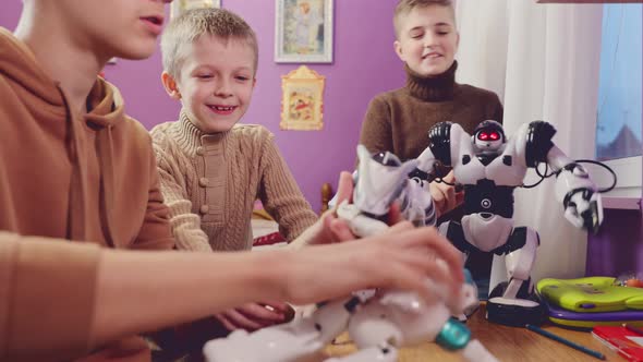 Children Playing with Toy Robots