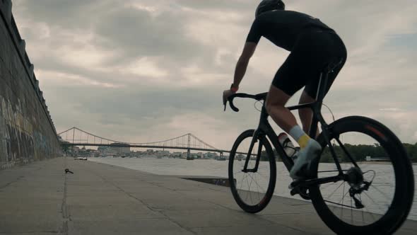 Hard Workout. Triathlete Cyclist Training Bicycle. Cyclist Sport Recreation Fitness Riding Triathlon alt