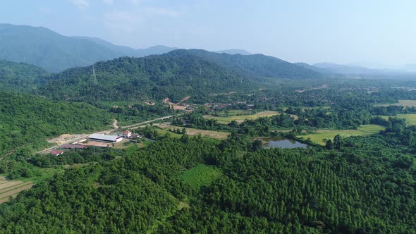 Natural landscapes around the city of Vang Vieng in Laos seen from the sky alt