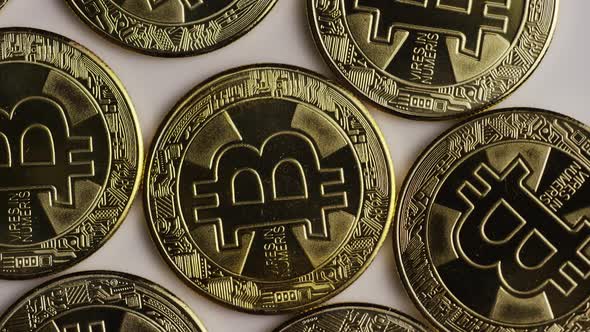 Rotating shot of Bitcoins  alt