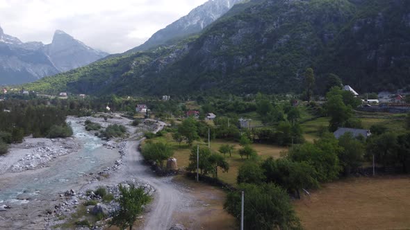 River Water Foaming and Splashing on Cliffs of Alpine Mountains in Theth Albania