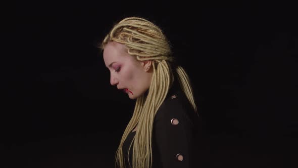 Creepy Vampire Spitting Blood After Hunt at Dusk alt