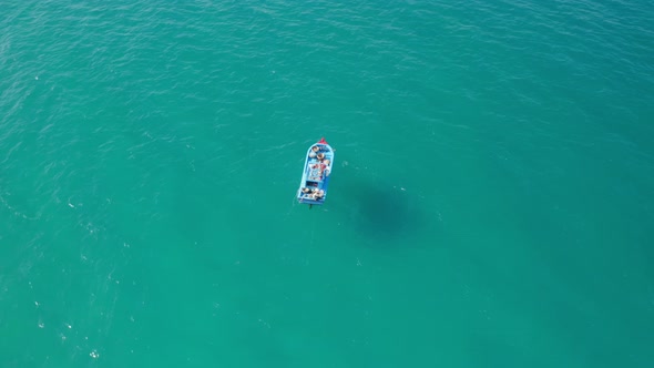 Drone view of a fishing boat on Cam Ranh beach,  Khanh Hoa province, central vietnam alt