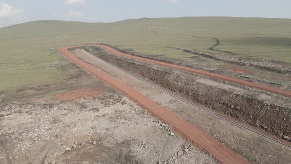 Moving along railroad tracks. Aerial view of Railroad emergency stop track in Trialeti, Georgia alt