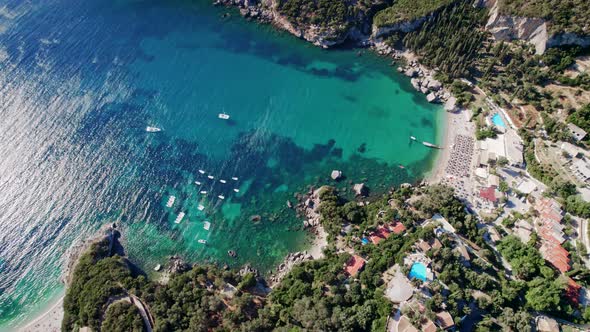 Aerial Drone View to Clear Blue Sea Water with Moored Boats and Yachts alt