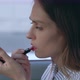 Female Doing Makeup in Car - VideoHive Item for Sale