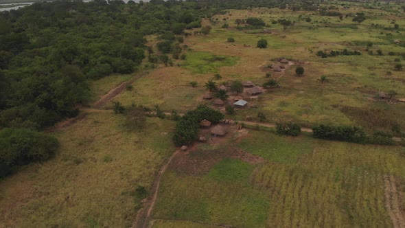 Aerial drone shot of a traditional, small and poor village in the middle of a nature landscape in Af alt
