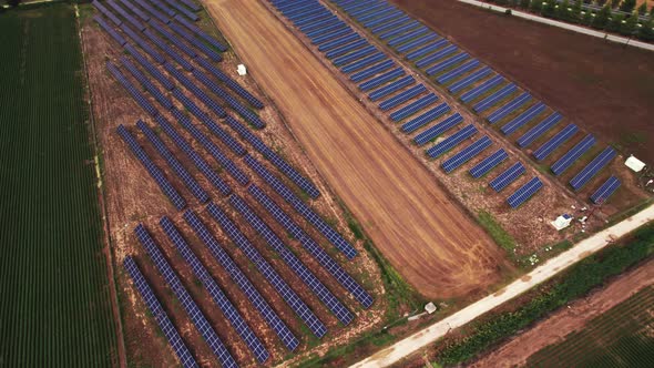 Beautiful Aerial View of Solar Panel Cell on the Field and Mt Osa in Background Greece alt