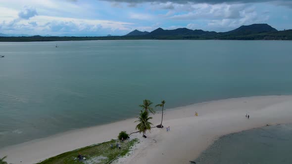 Couple Men and Women Walking on the Beach at the Island Koh Yao Yai Thailand Beach with White Sand alt