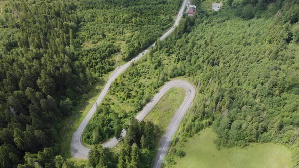 Aerial View of Cars Driving on Country Road